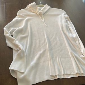 White turtleneck sweater in size medium